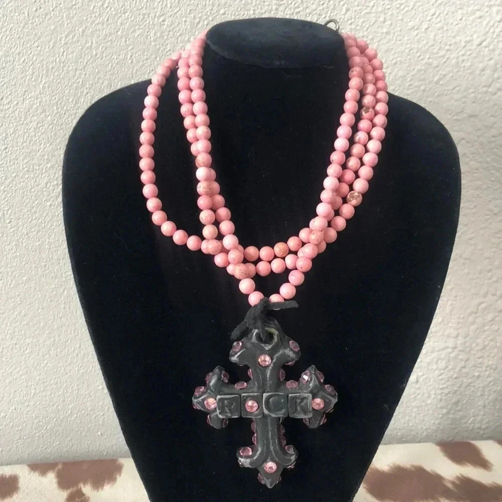 Pink Necklace with black cross. Adjustable length